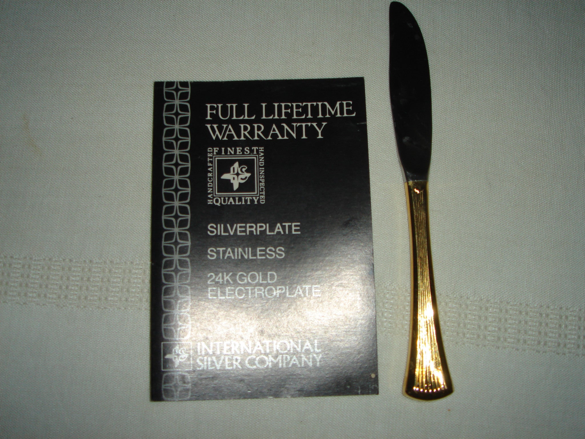 International Silver Company - 24 carat Gold Electroplate cutlery- service for 12